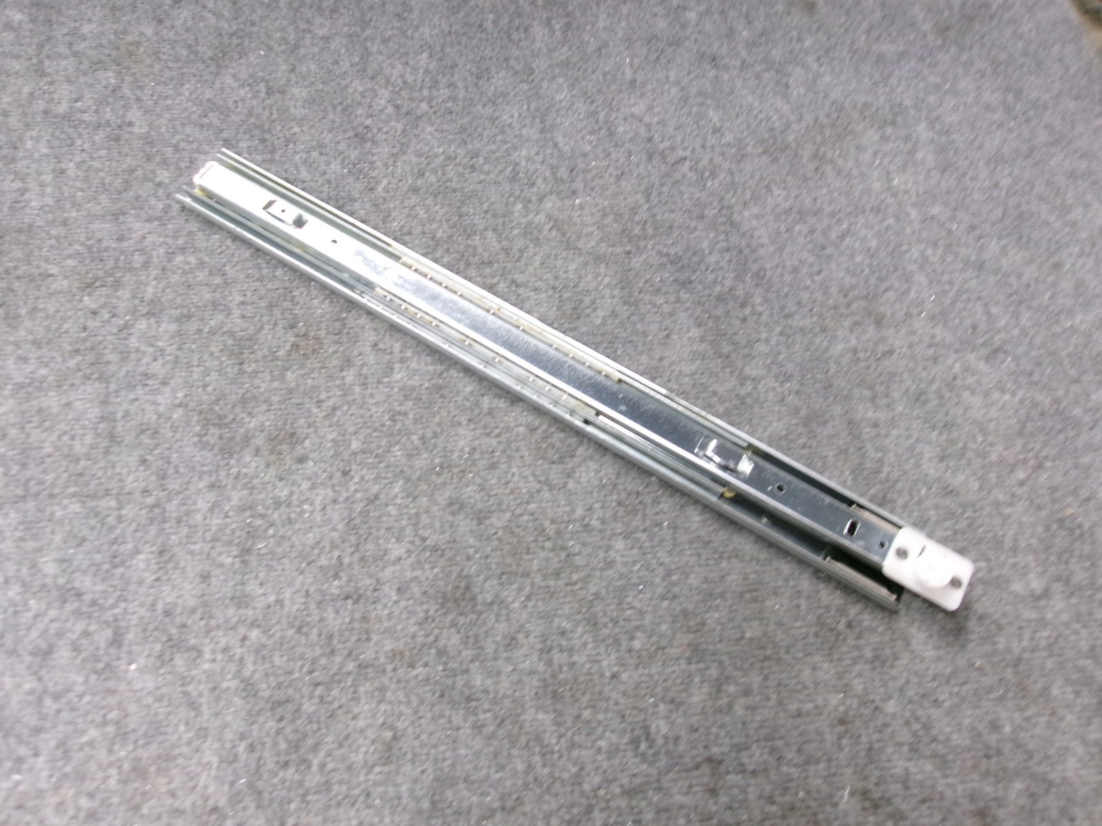 MGT61844002 KENMORE FREEZER DOOR SLIDE RAIL LEFT SIDE gallery