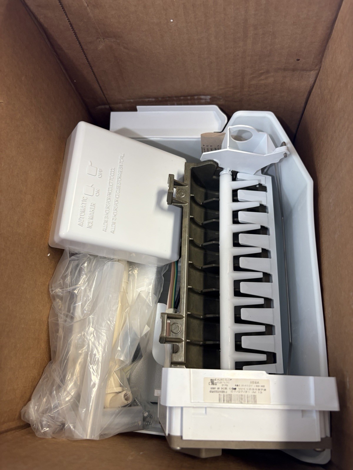 OEM W10715708 Whirlpool Refrigerator Ice Maker Bucket and Valve gallery