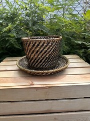 Authentic Nito wicker plant basket with detached plate base