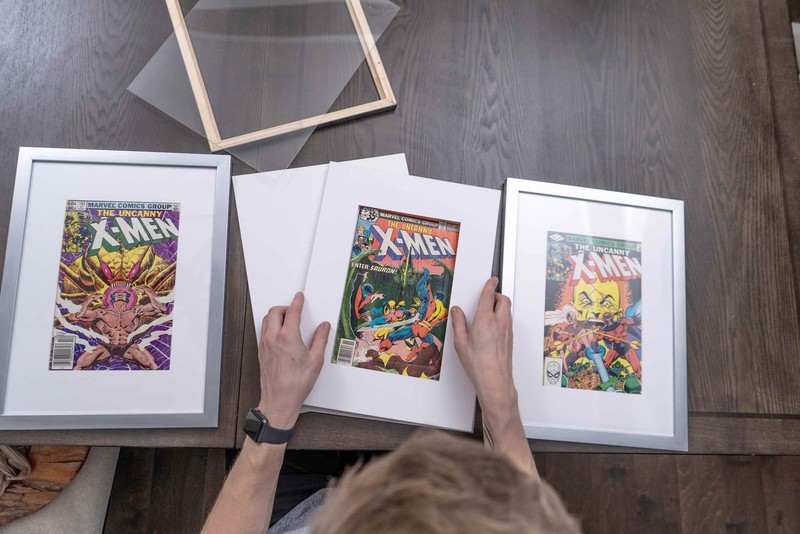 Black Comic Book Frame w/ Black Mat To Display 12 Graded Comics Horizontally gallery