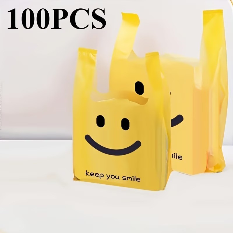 100pcs Smiley Face Plastic Tote Bags – Reusable Retail Gift Bags Yellow gallery