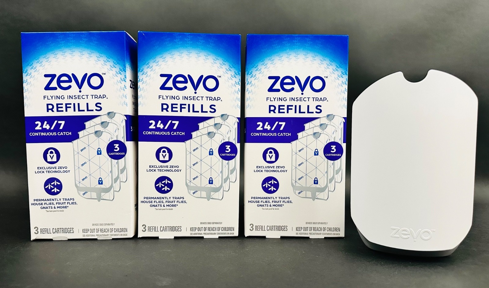 Zevo Flying Insect Trap Starter Kit – 1 Plug-In Device + 9 Refill Cartridges gallery