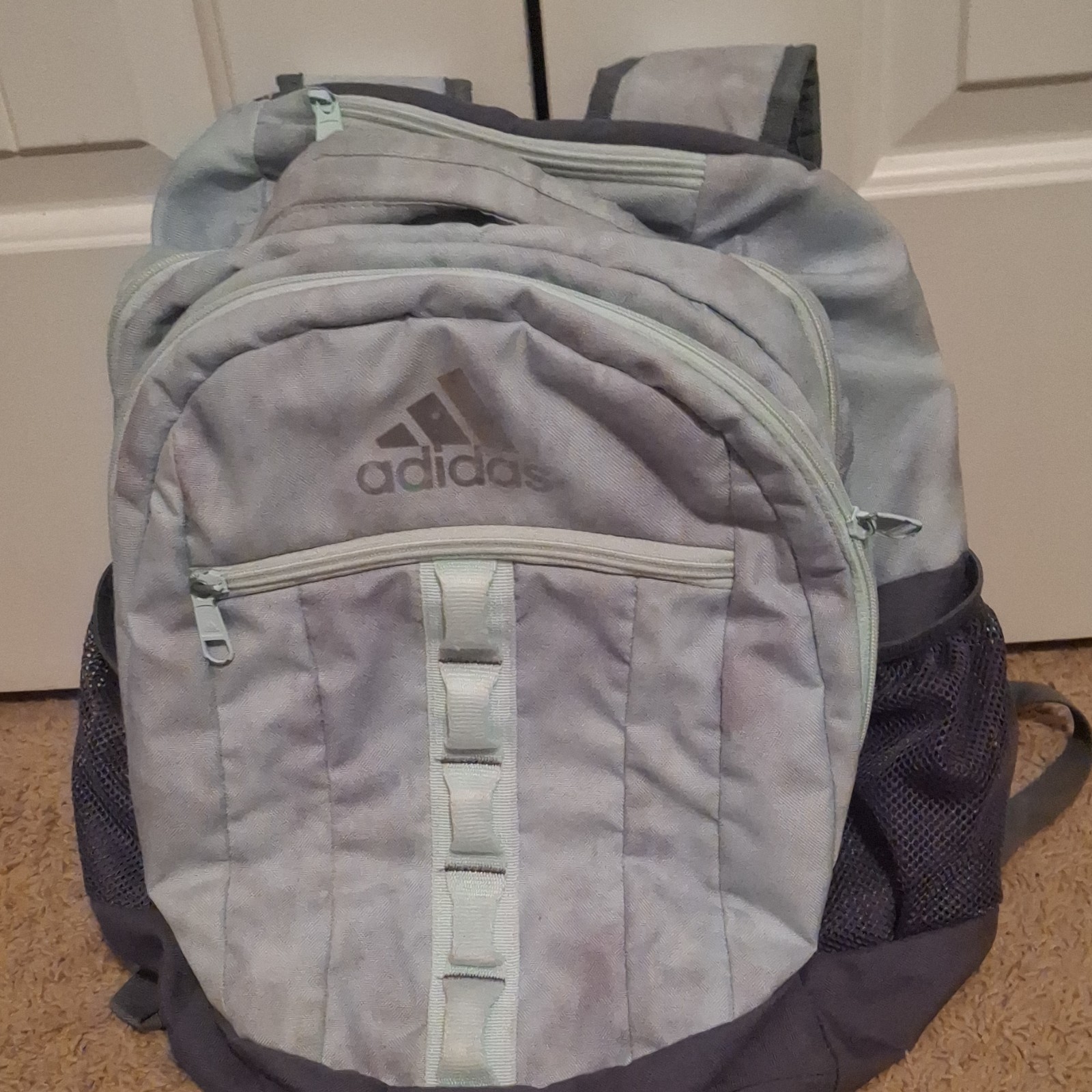 Adidas light blue with pink splash design Backpack 5 Pockets. 2
