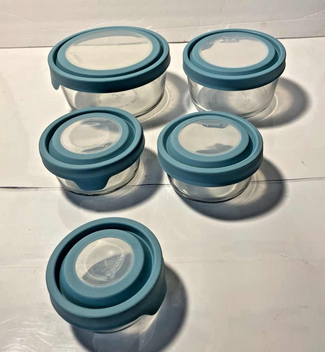 5 Anchor Hocking Snugfit Glass Storage Bowls w/blue lids 1, 2, 4, 7, cups gallery