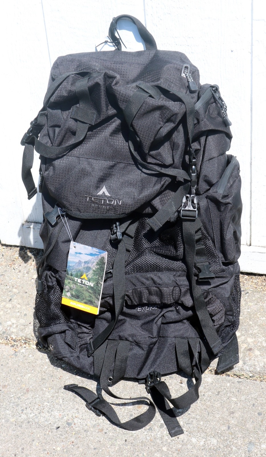 Teton 65L Explorer Internal Frame Backpack with rain cover.