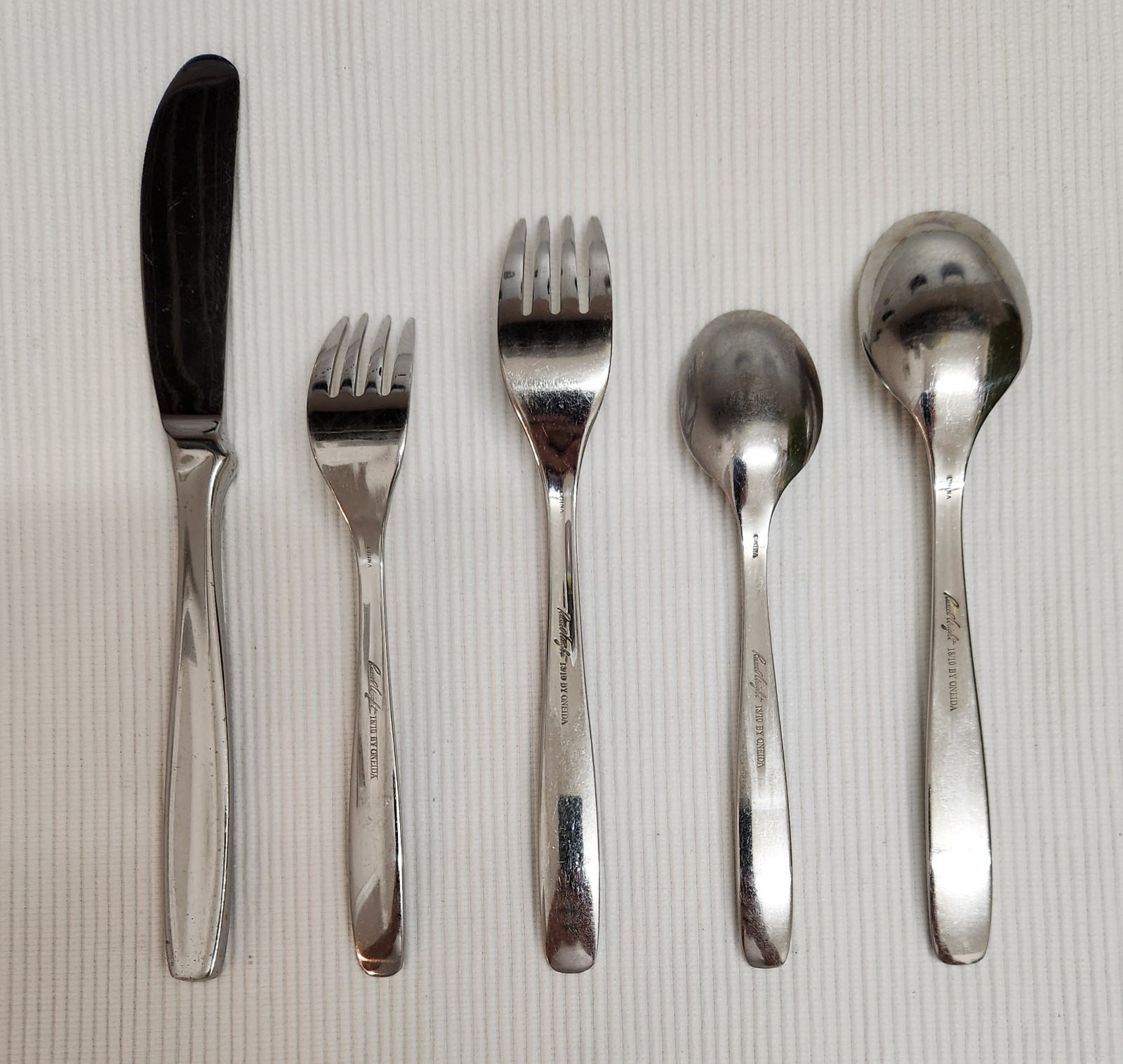 Russel Wright Oneida 18/10 Stainless Steel Flatware - One 5-Piece Place Setting gallery