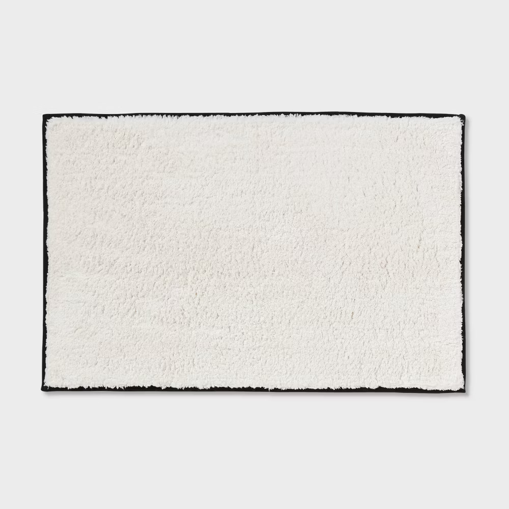 24"x36" Oversized Border Bath Rug Black/White - Threshold gallery