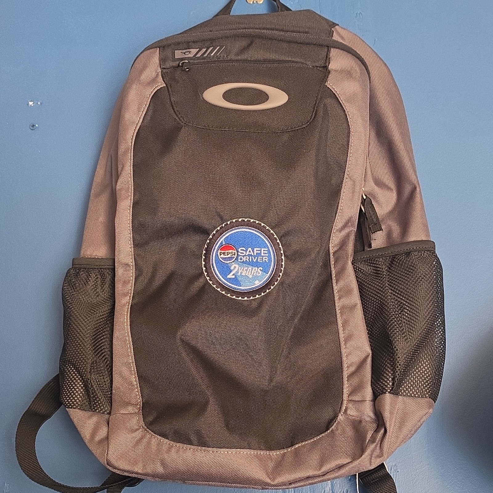 Oakley Black Gray Polyester Hiking Backpack with Pepsi Safe Driver Patch