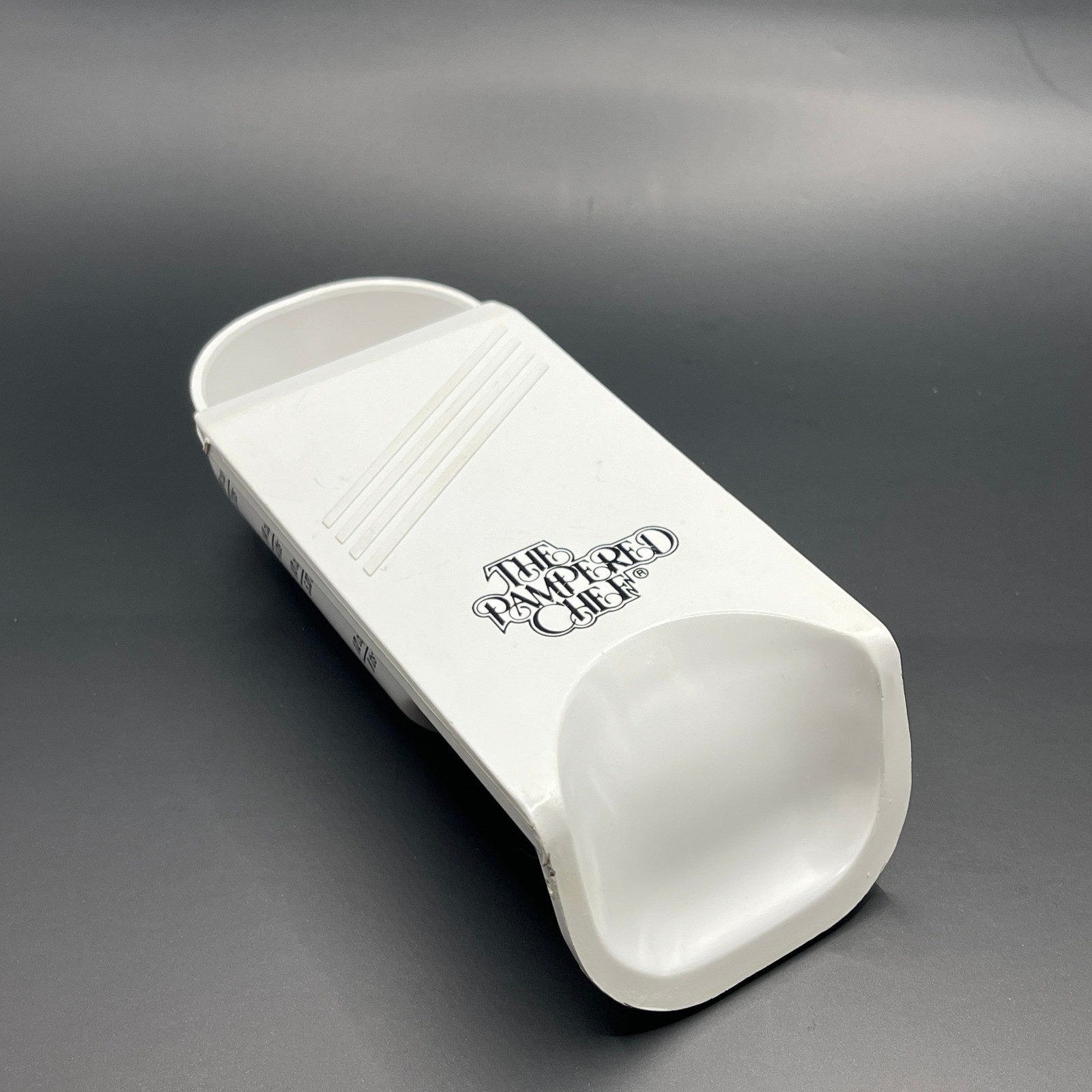 The Pampered Chef Adjustable Measuring Cup White Plastic 1/2 Cup 125ml USA made gallery