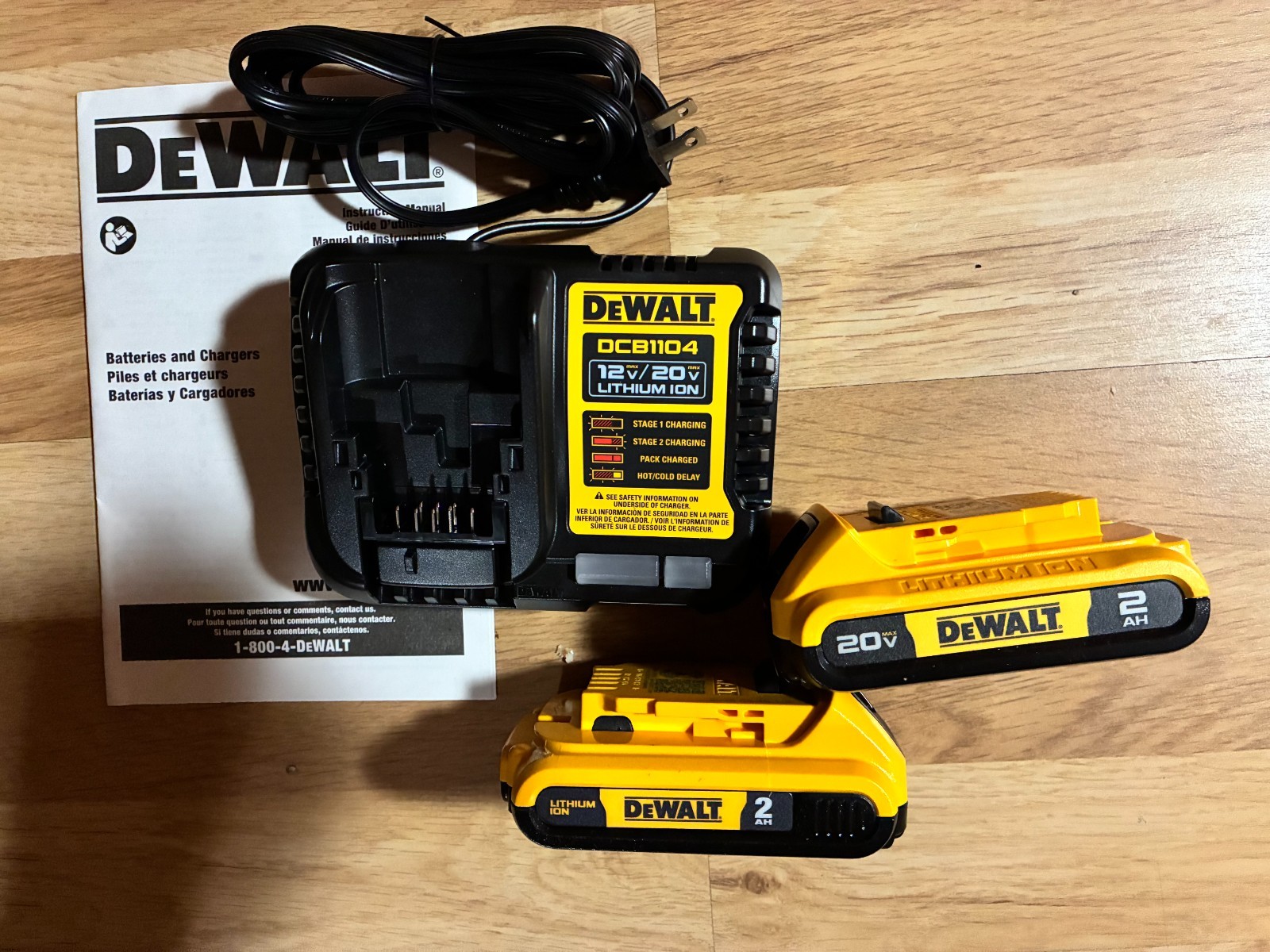 Two Dewalt DCB203 Batteries and DCB1104 charger gallery