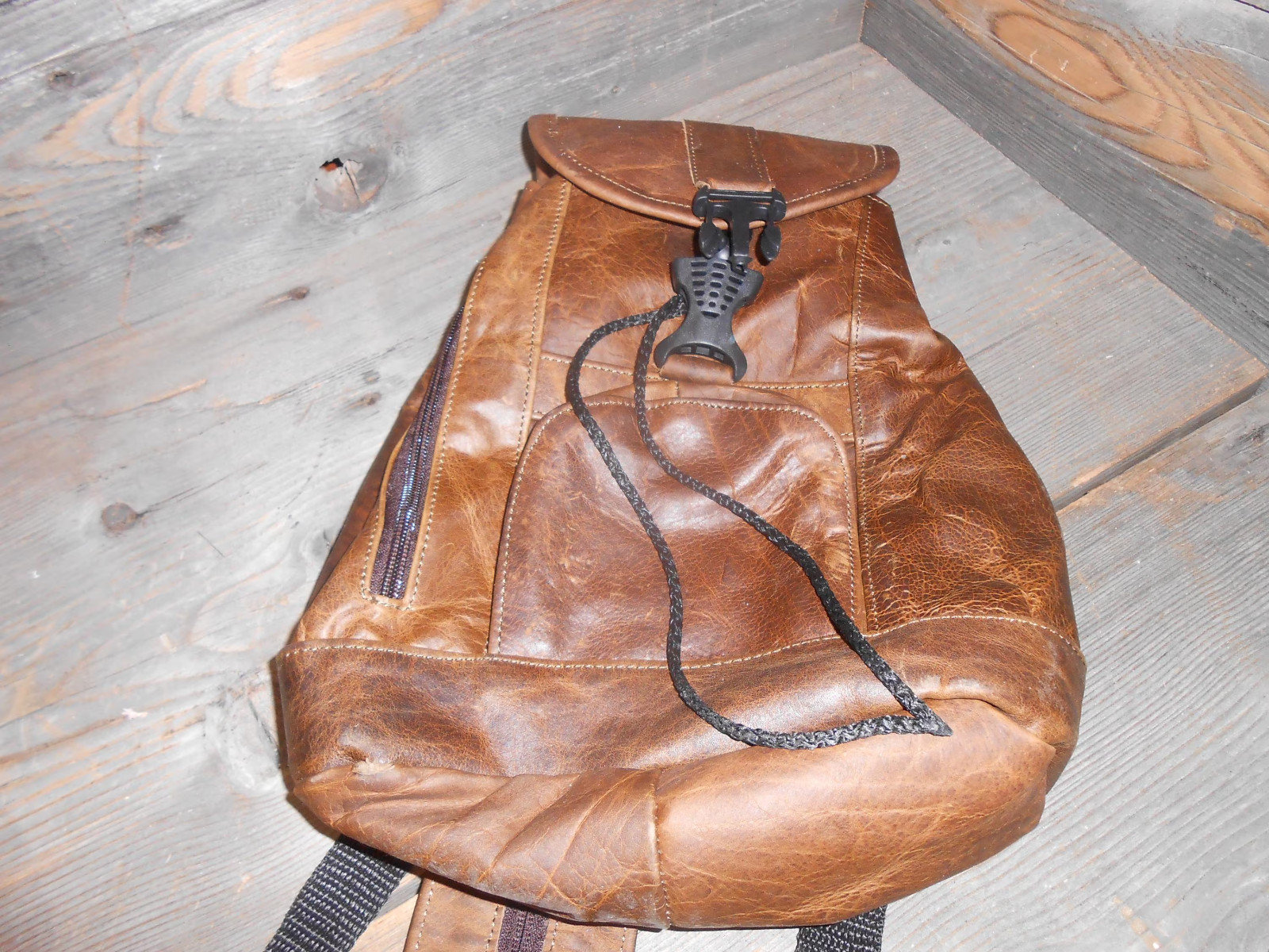 Leather backpack.New small to medium sized backpack spacious with zipper pockets 2