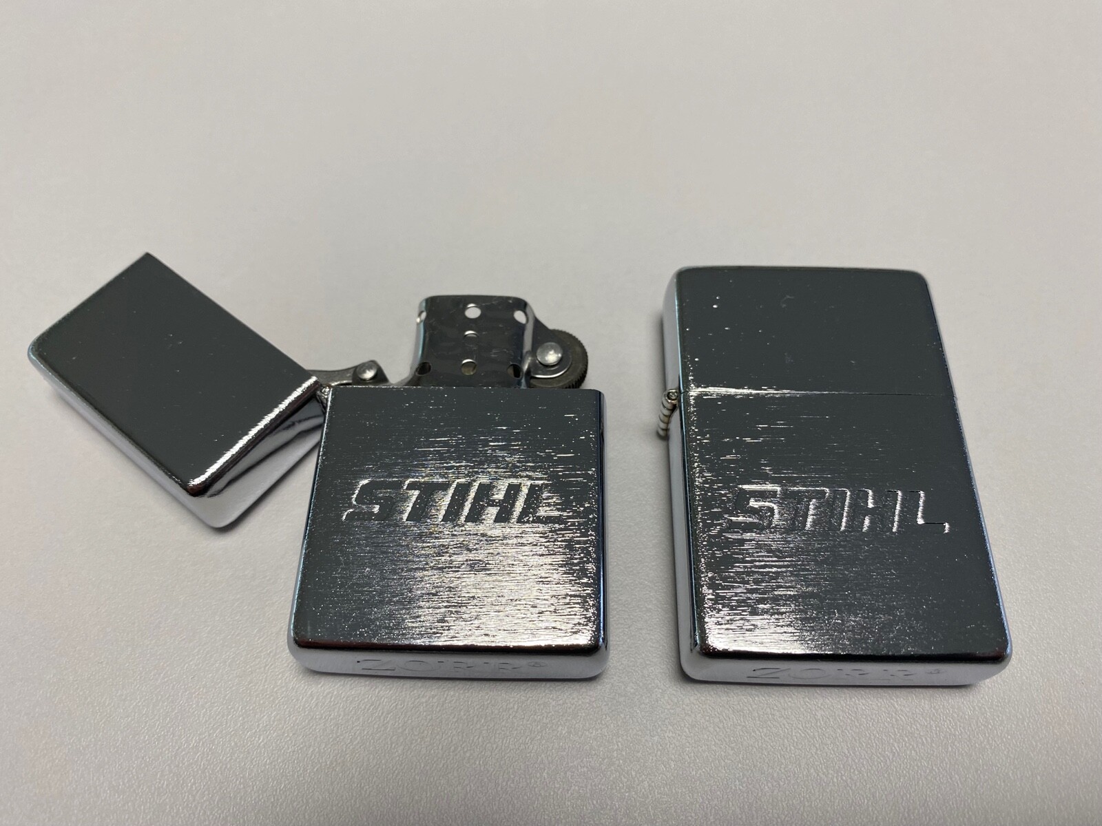 STIHL Merchandise Original Fuel Lighter Collectable Chainsaw 0464-303-0000 2PCS gallery