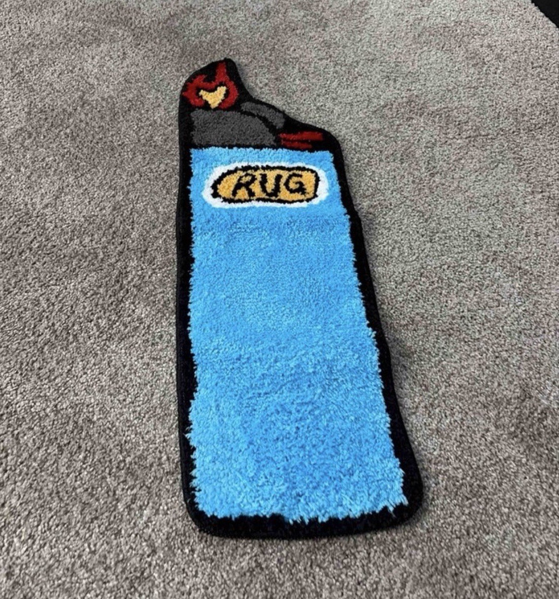 BIC lighter Rug Mat, Blue/Black/Gray/Red/Yellow, Under 20 in gallery