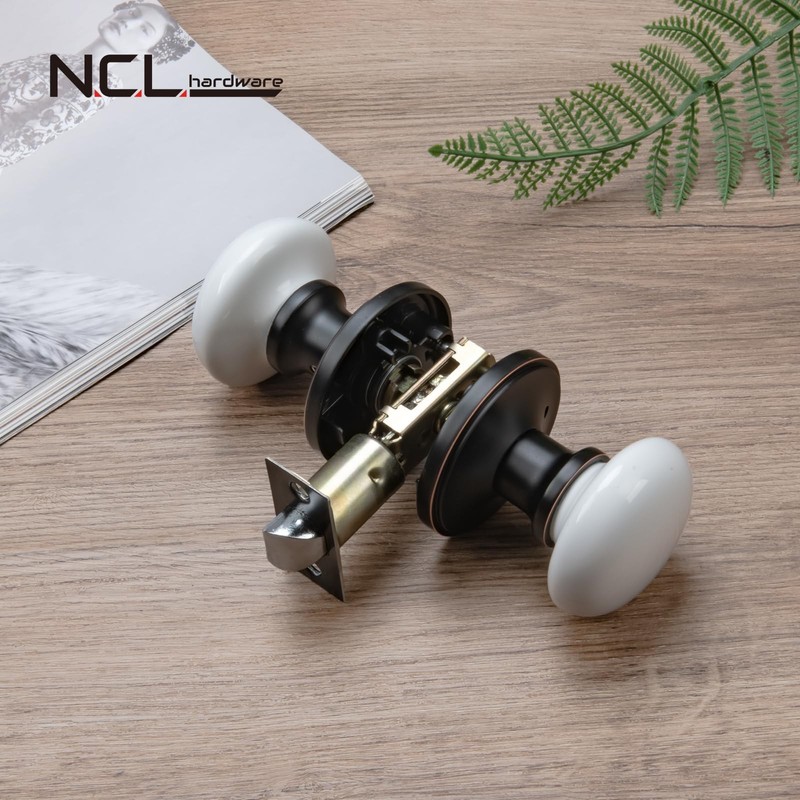 NCL White Porcelain Door Knobs, Oil Rubbed Bronze Keyless Door Levers gallery