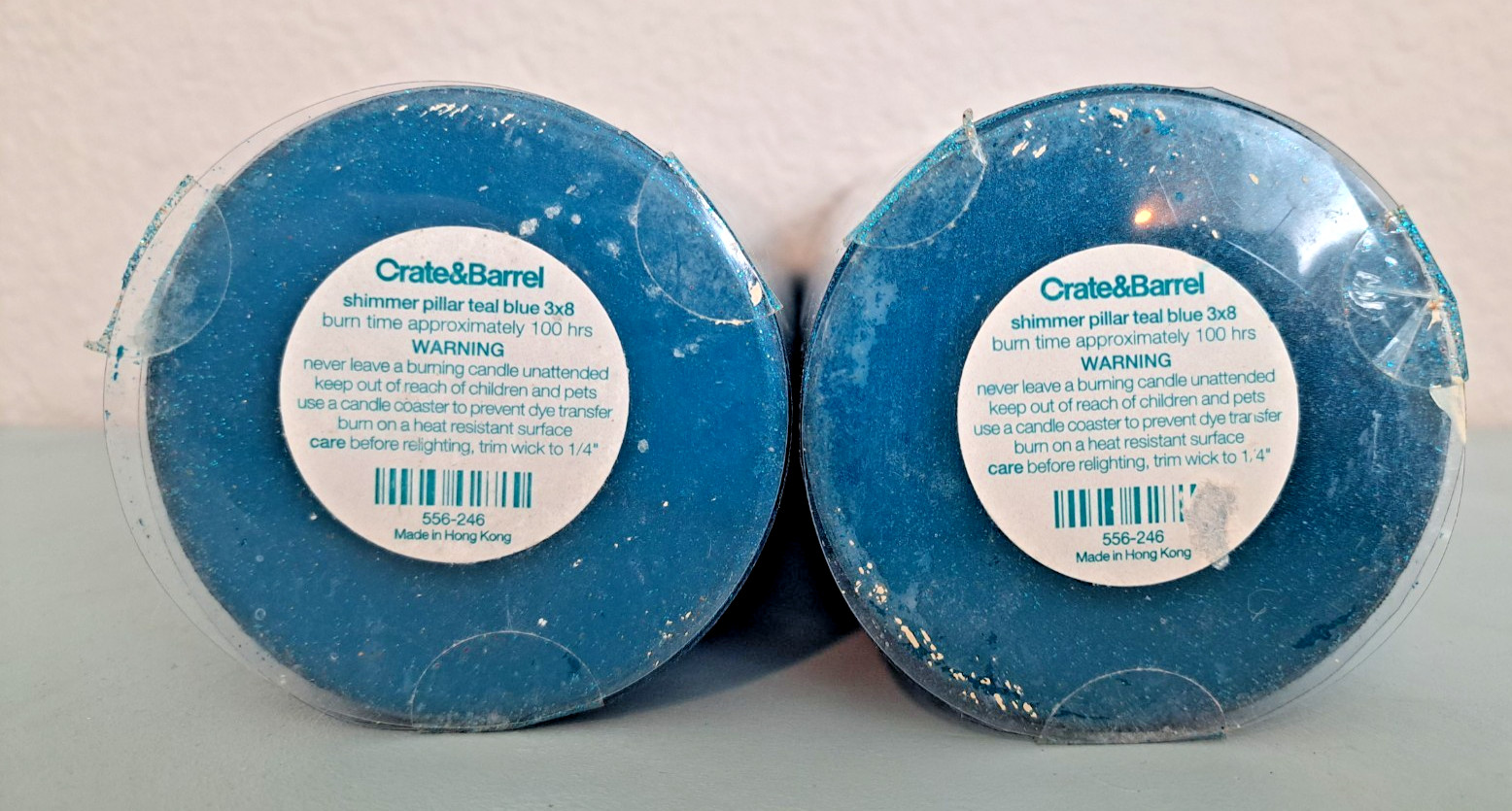 NEW ~ CRATE & BARREL (2) Shimmer Pillar Teal Blue 3x8 100 hrs. Burn time gallery