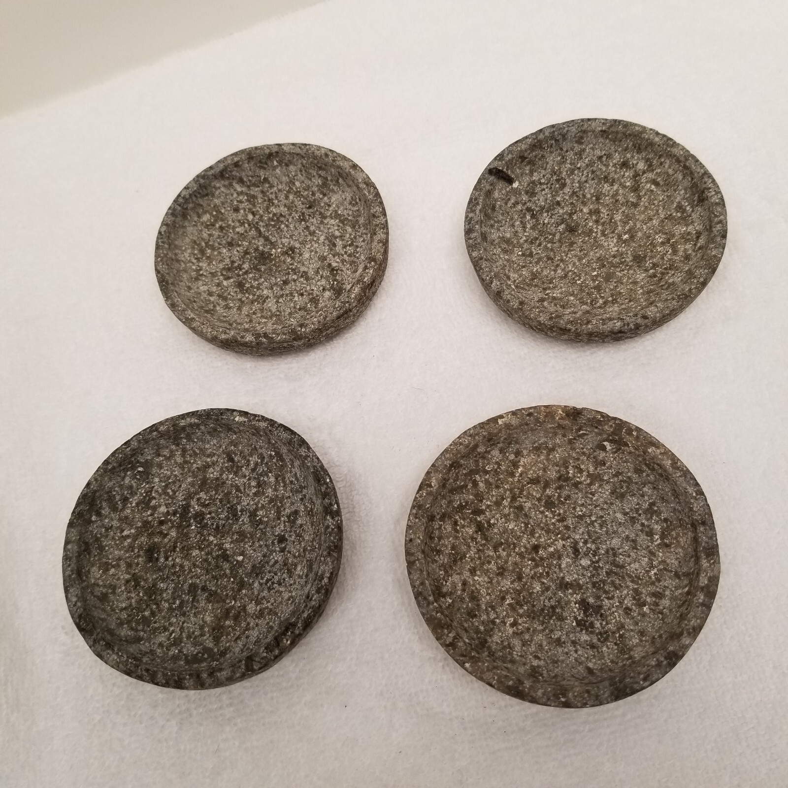 Riverstone side 4- small dishes 3" wide less than 1" tall for grinding stuff in gallery