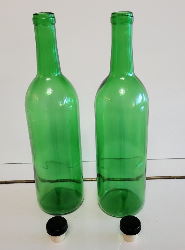 2 EMERALD GREEN CORKED GLASS BOTTLES SOLID DESIGN 11.5 INCHES HOLDS 22 OZS gallery