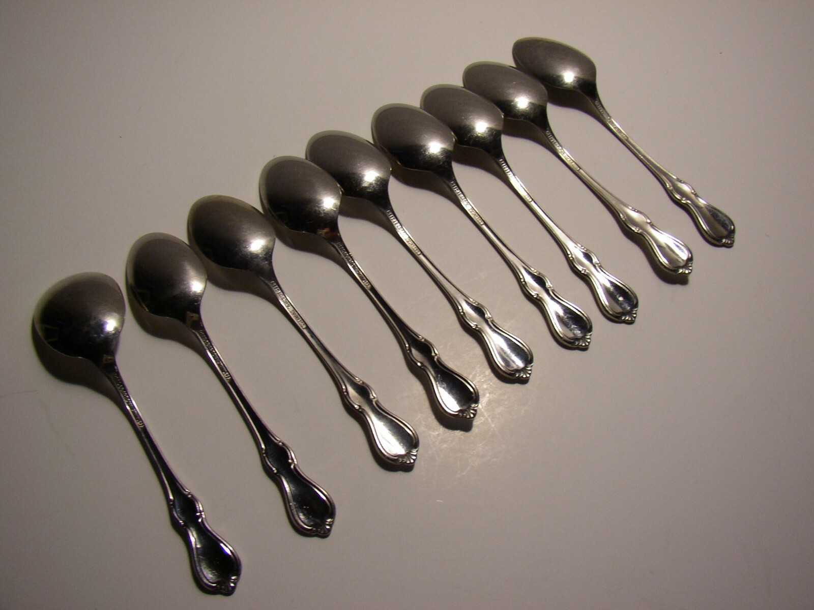 9 PC Reed & Barton CAMELOT Stainless 8 Teaspoons & 1 Sugar Spoon 6" gallery