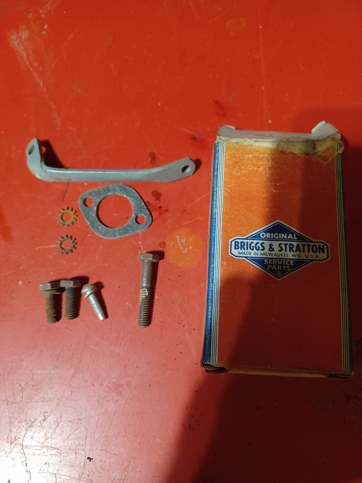 Briggs & Stratton Pn#298082, Carb Kit Bracket OEM. NOS gallery