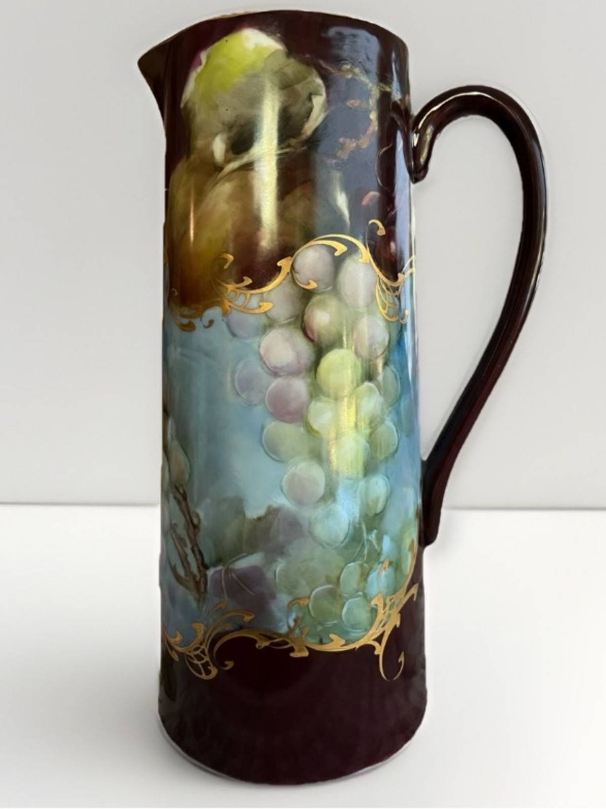 Vintage Hand-Painted Large Brown and blue Grape Pitcher with Gold Scrolls gallery