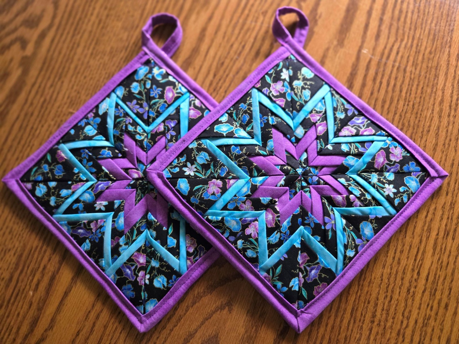 Handmade Hot Pads/Trivets - Amish Folded Star Thick - "Teal & Purple Flowers" gallery