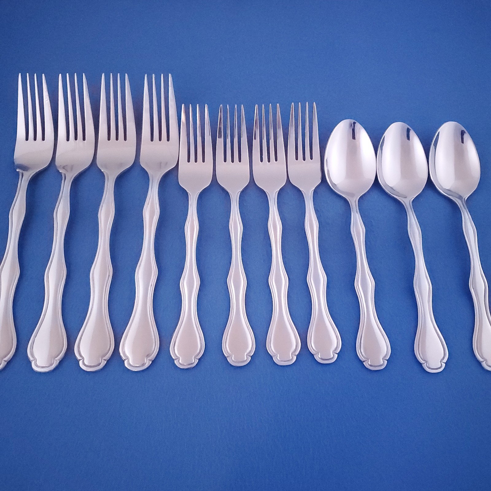Hampton Unknown Pattern (4) Dinner Forks, (4) Salad Forks & (3) Soup Spoons gallery
