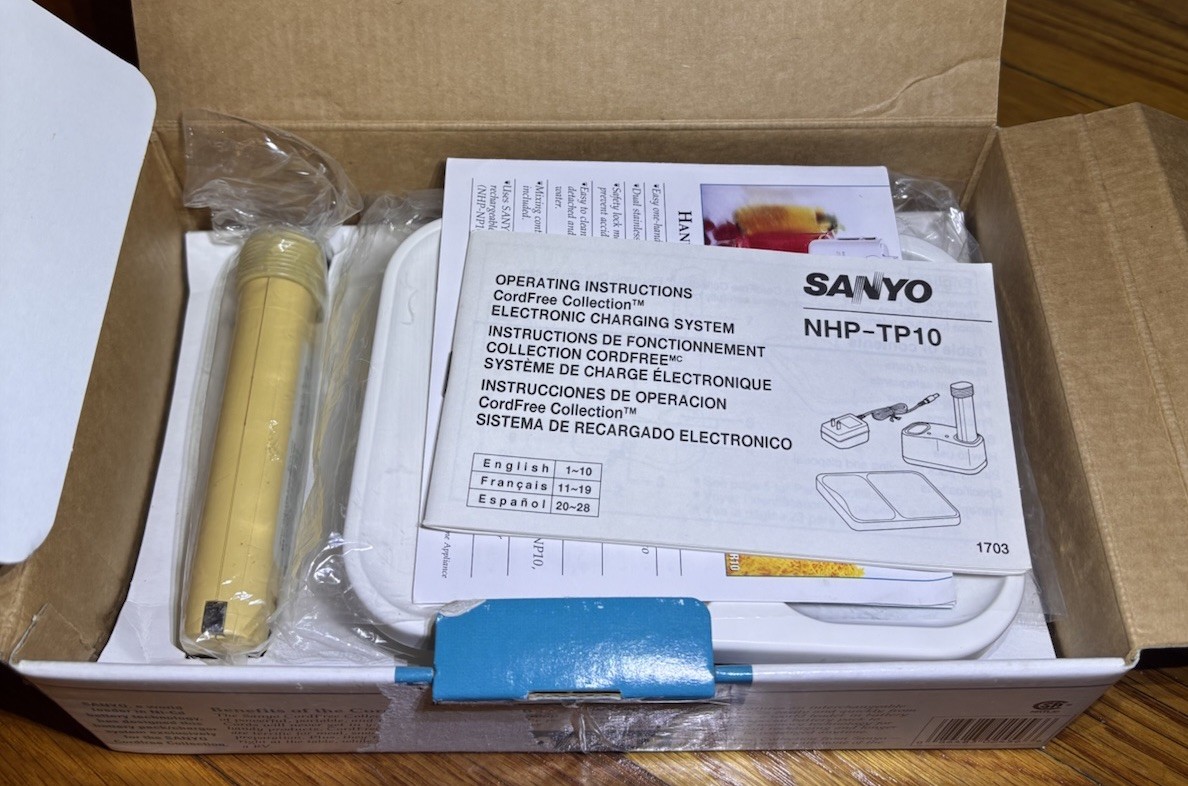 Sanyo CordFree Collection Battery Pack & Electronic Charger NHP-TP10 New READ gallery
