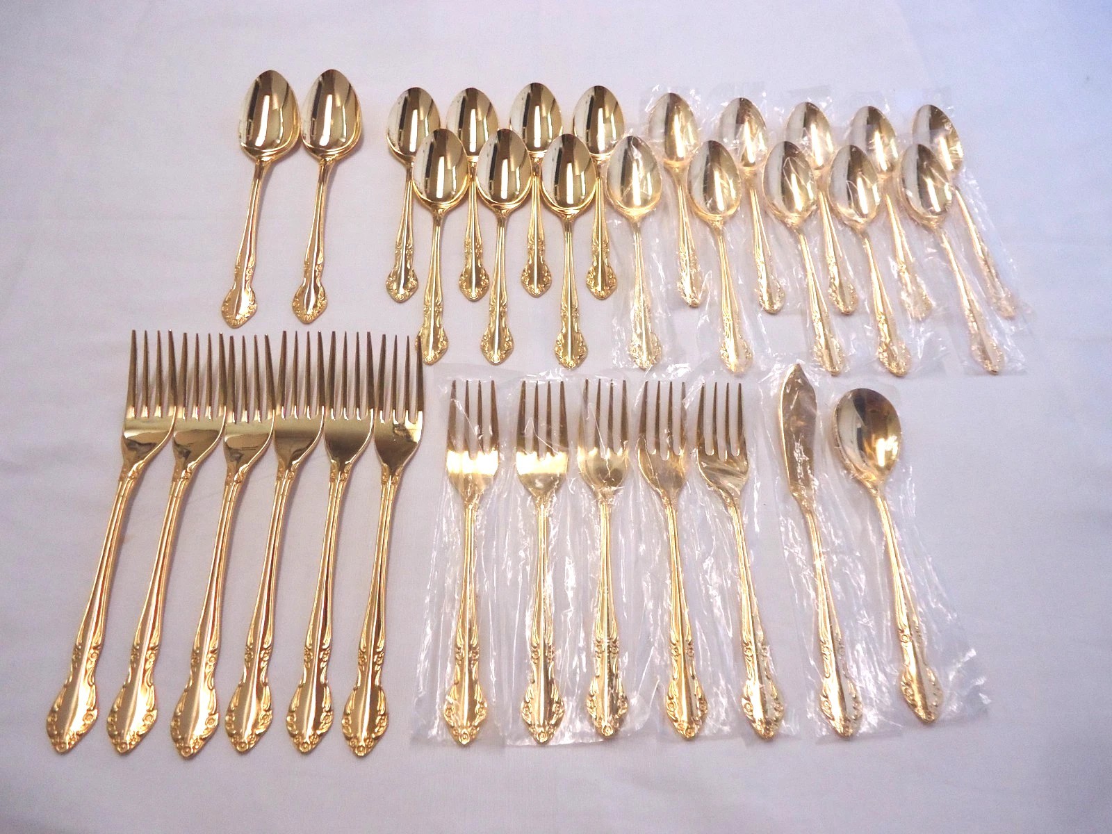 STAINLESS STEEL GOLD PLATED FLATWARE JAPAN 32-PIECES gallery