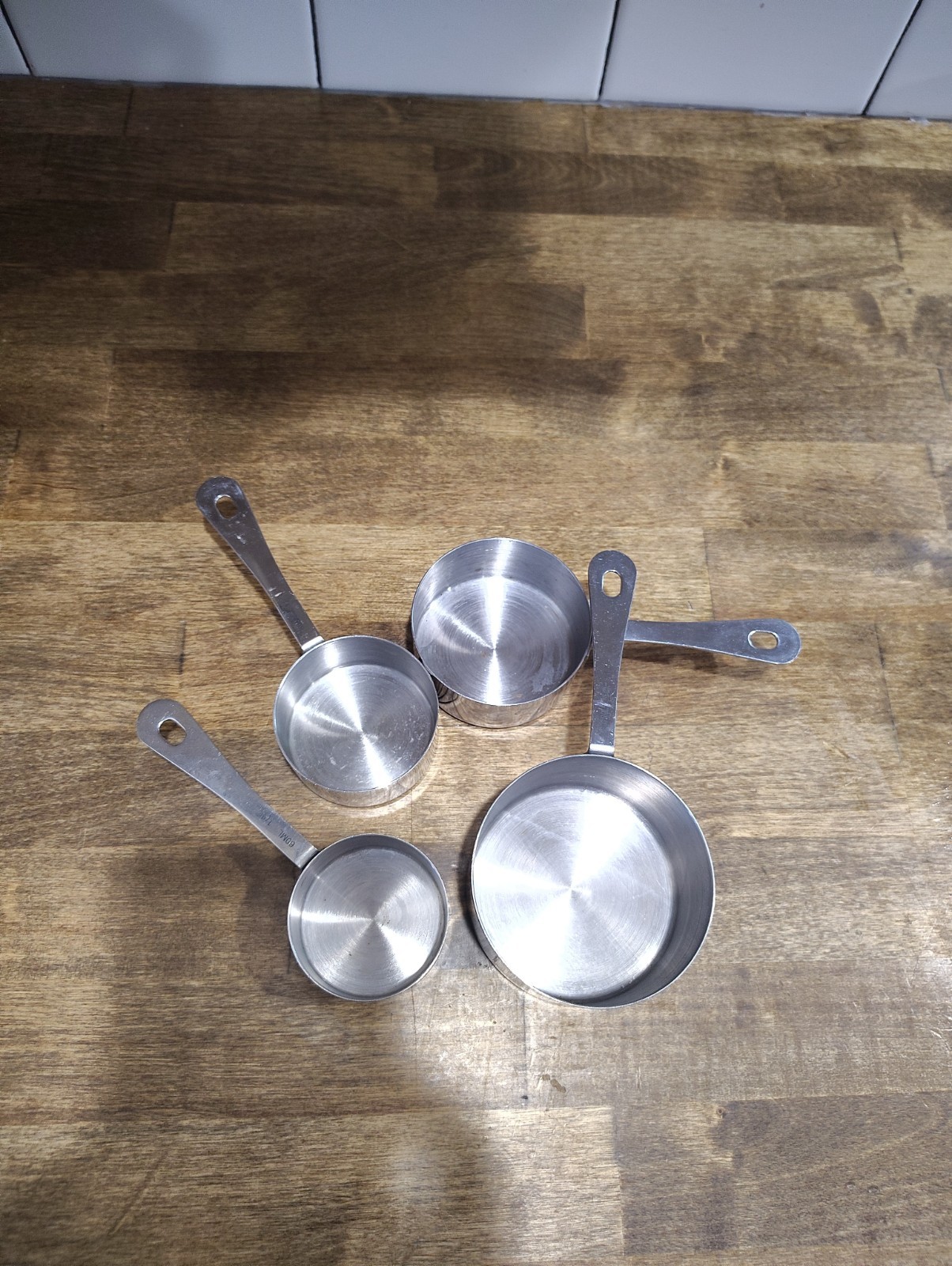 Oneida Stainless Steel 4pc Measuring Cup Set 1 Cup, 1/2 Cup, 1/3 Cup, 1/4 Cup. gallery