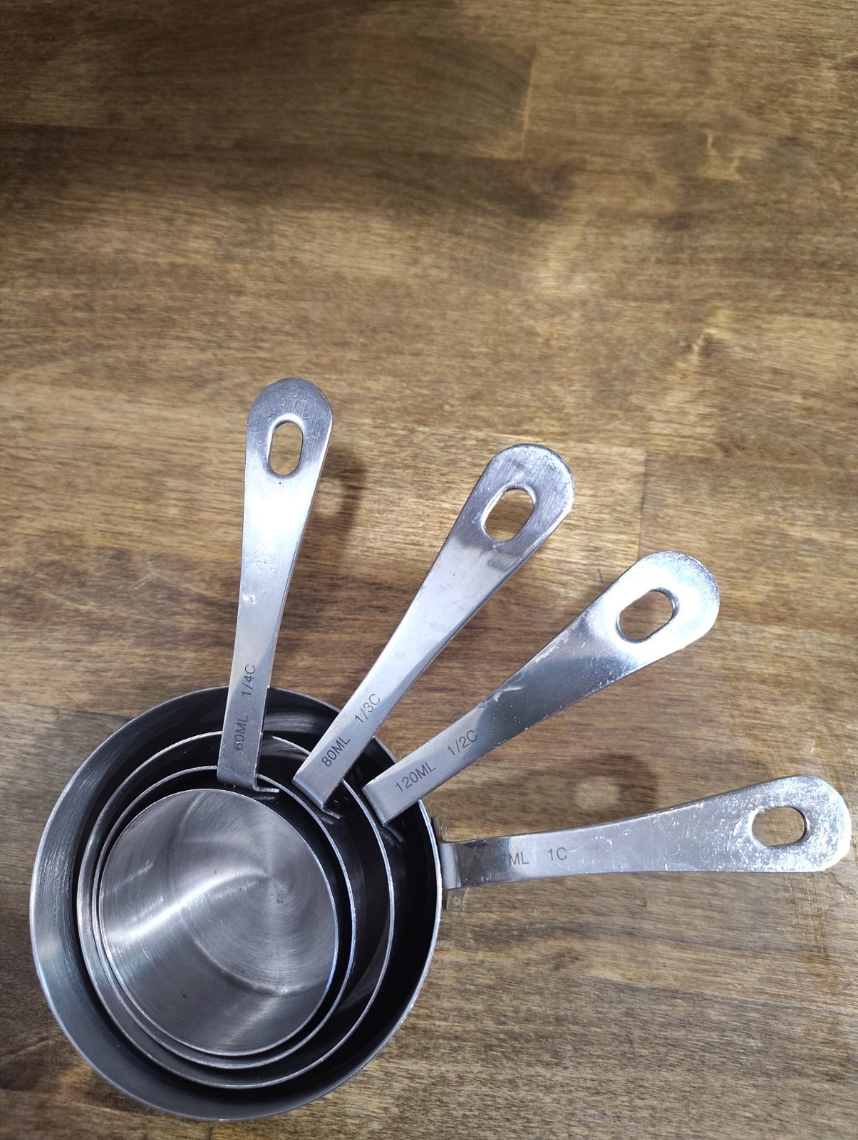 Oneida Stainless Steel 4pc Measuring Cup Set 1 Cup, 1/2 Cup, 1/3 Cup, 1/4 Cup. gallery
