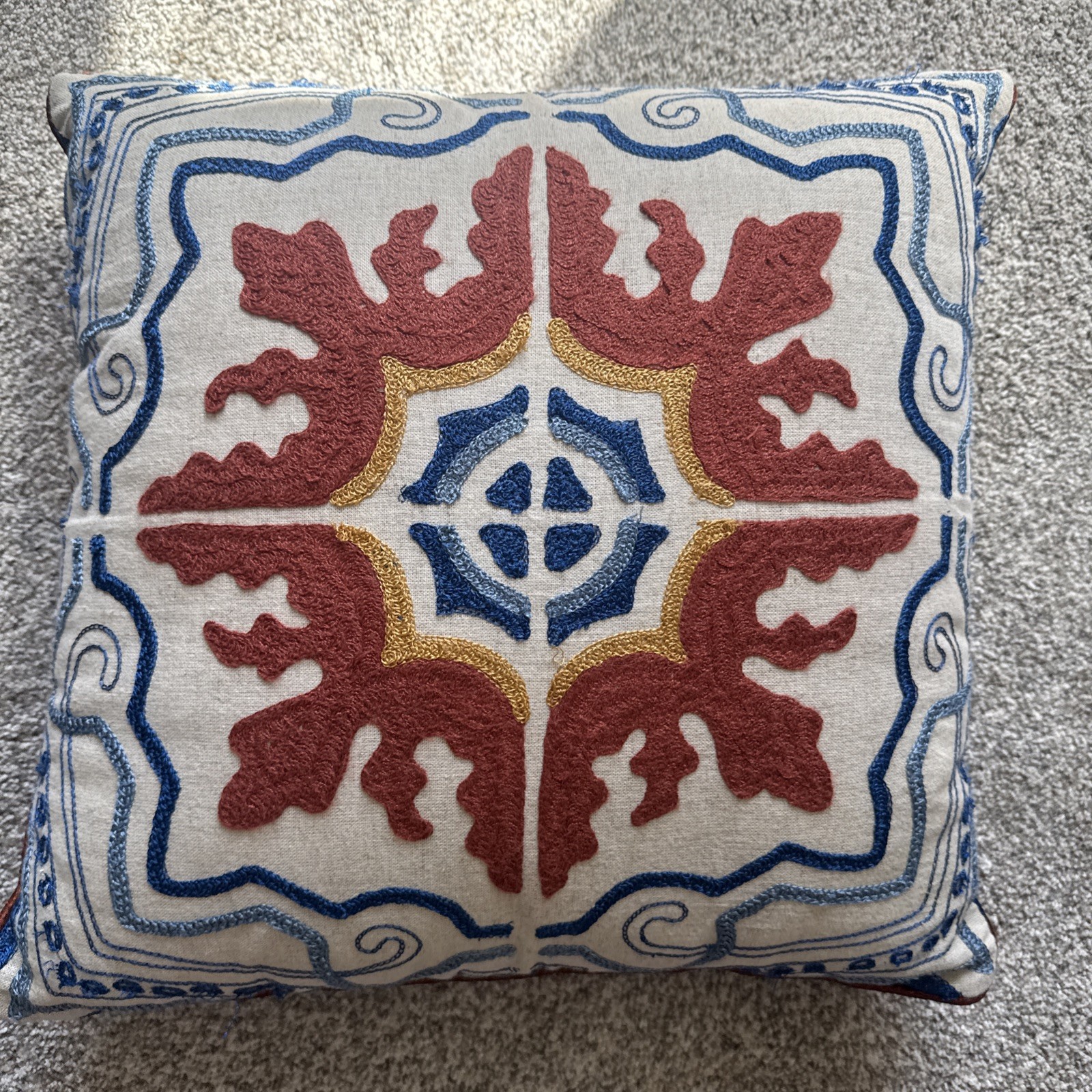 Pier 1 Embroidered Medallion Design rust blue, cream, tan back Throw Pillow gallery