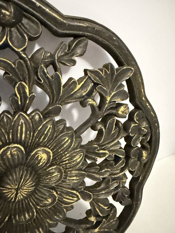floral wall medallion featuring a black and gold patina finish gallery