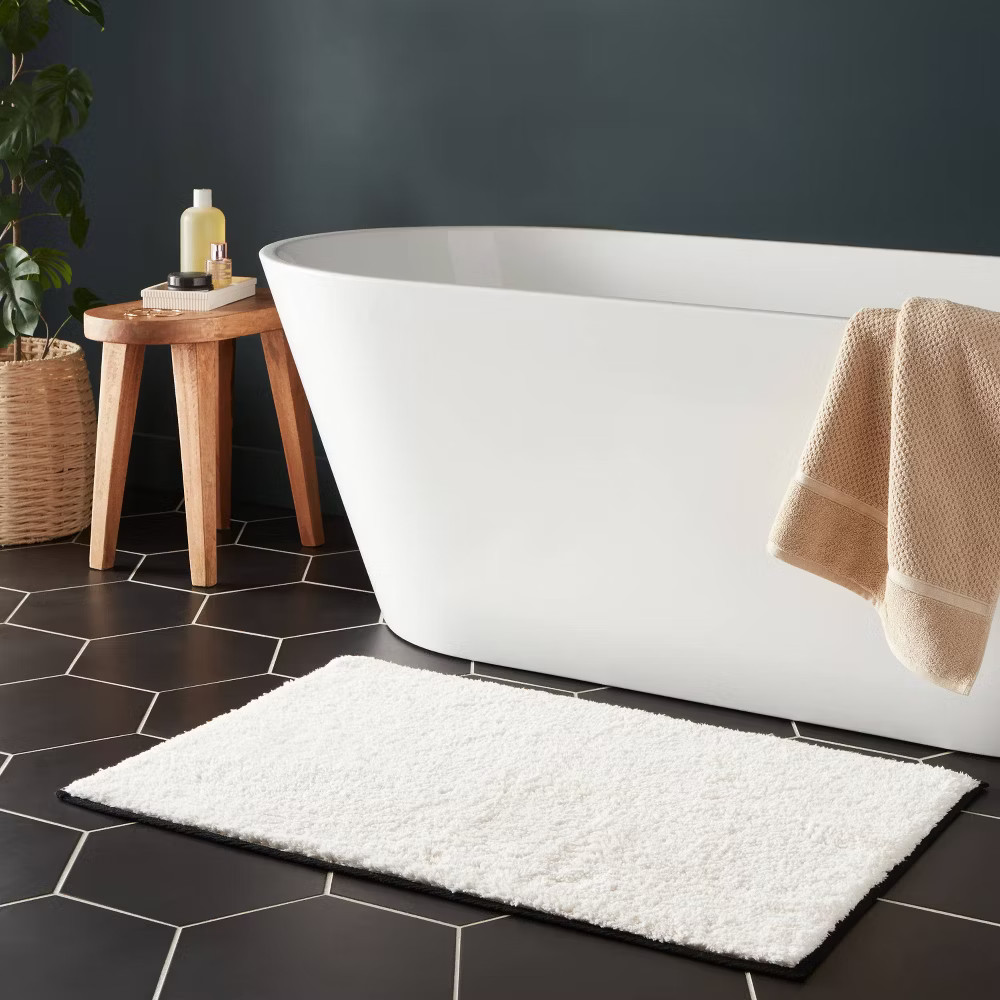 24"x36" Oversized Border Bath Rug Black/White - Threshold gallery