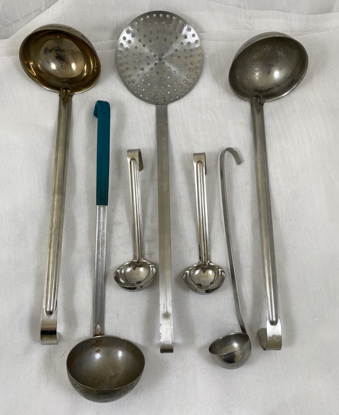 (7) STAINLESS LADLES 8OZ, 6OZ, & 1 1/2OZ VOLLRATH & UNBRANDED, USED gallery