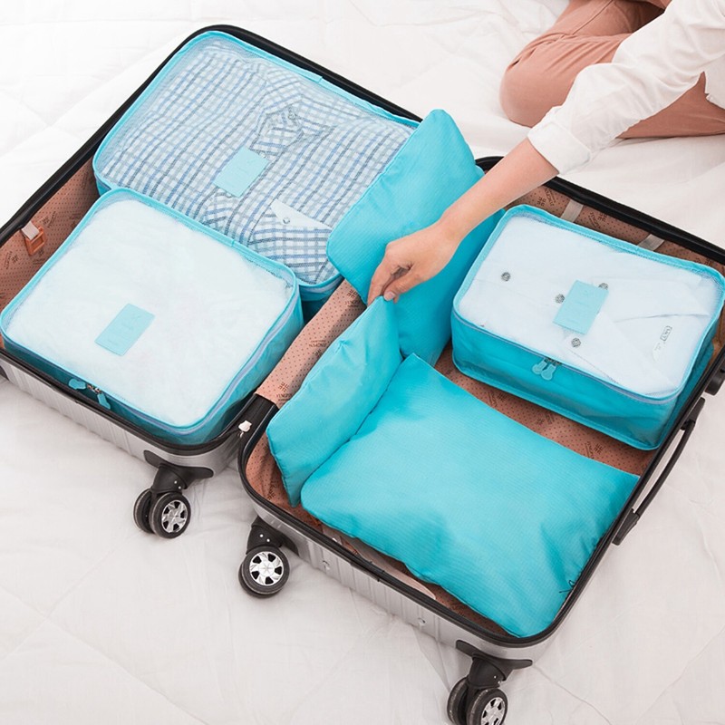 9-Pack Water-Resistant Clothes Storage Bags - Durable Travel Luggage Organizer gallery