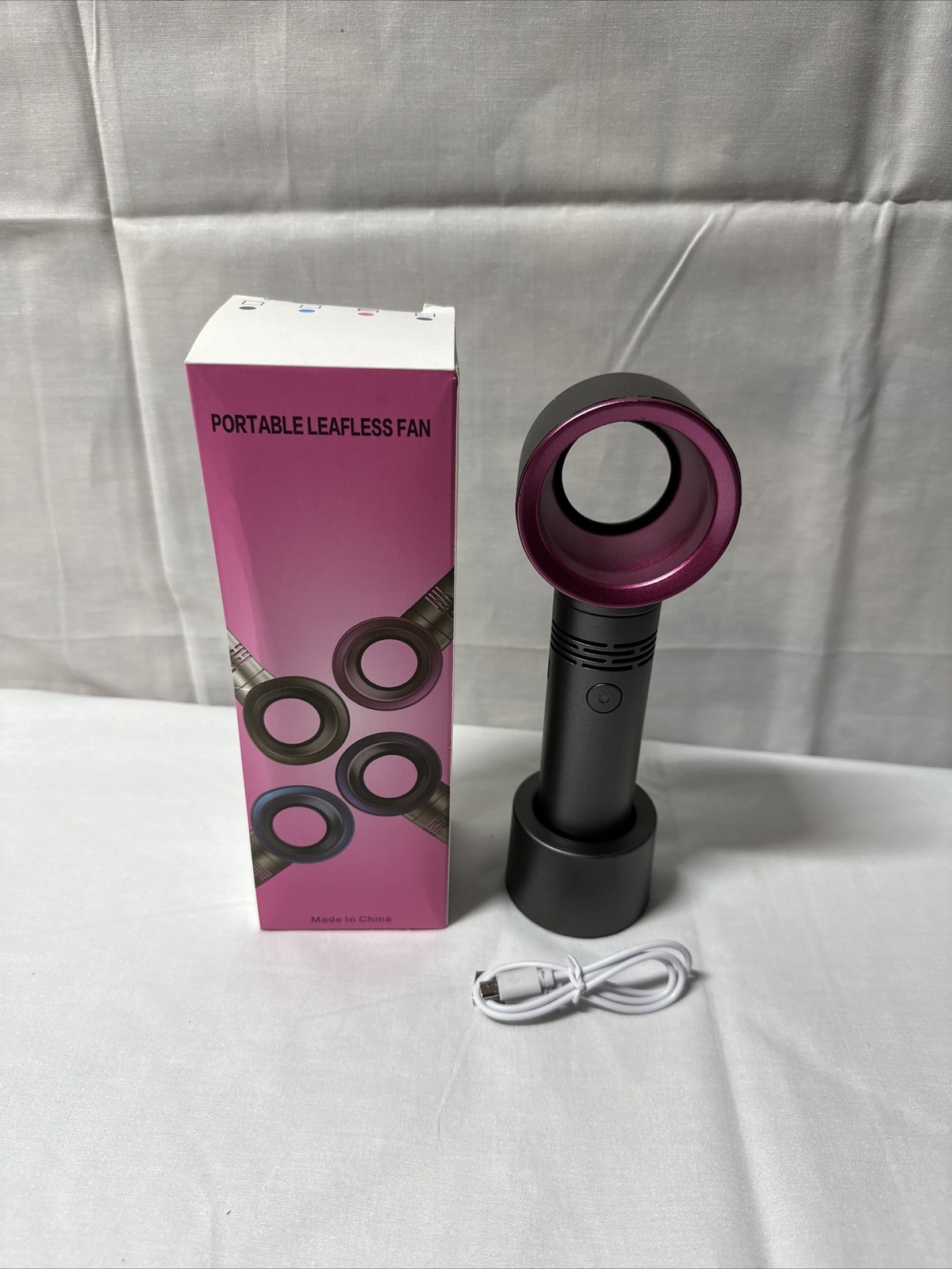 Handheld leafless fan desktop portable creative mini fan USB rechargeable PINK gallery