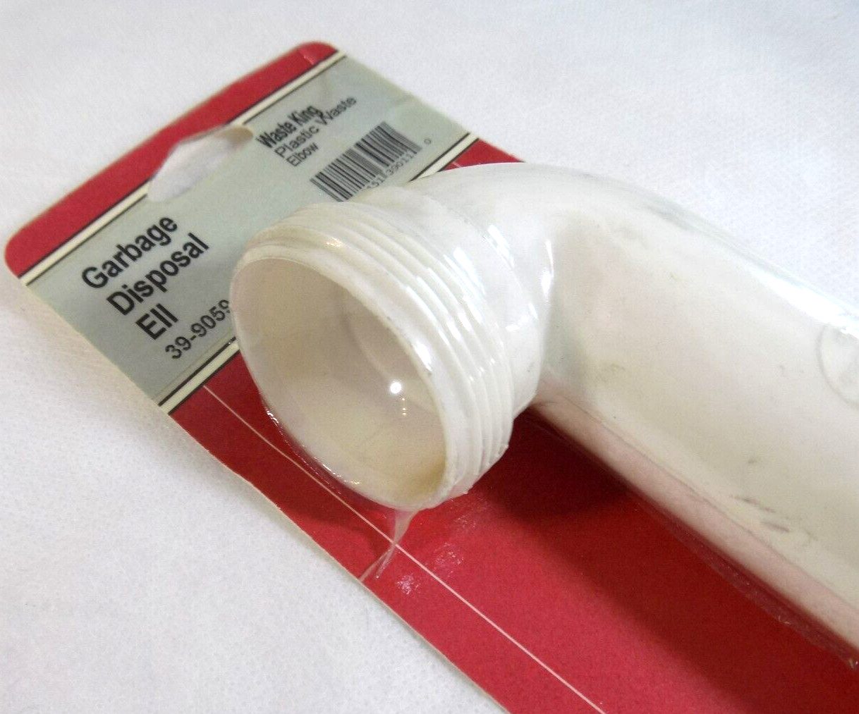 Waste King - Garbage Disposal Ell Lasco MPN - 39-9059 White Replacement Part gallery