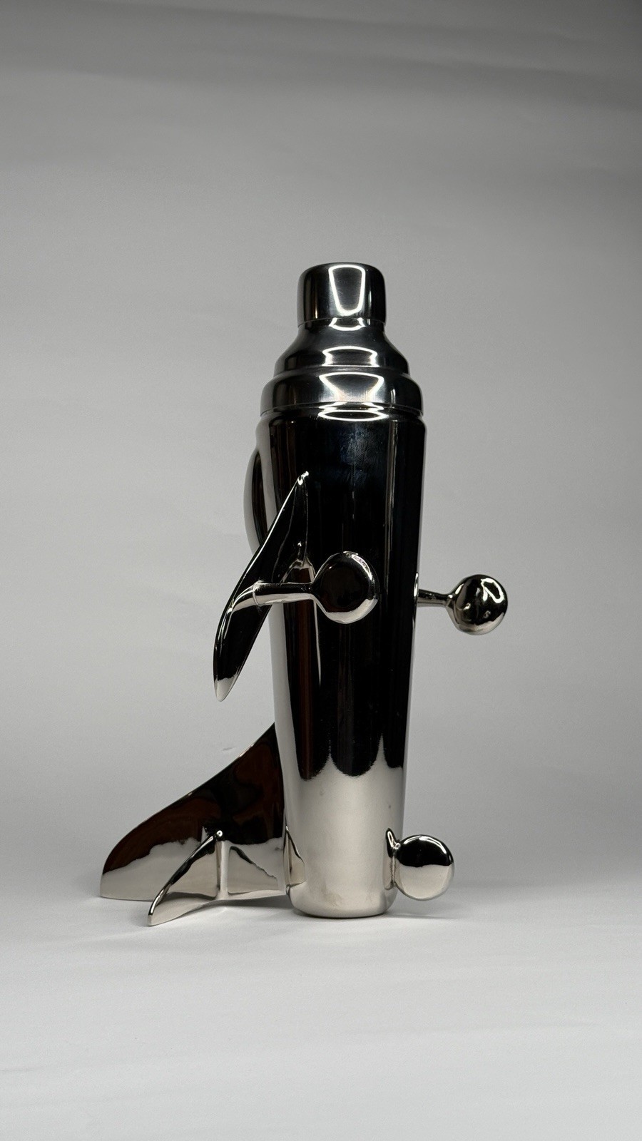 CB2 "Take Off" airplane-shaped cocktail shaker designed by Brett Beldock gallery