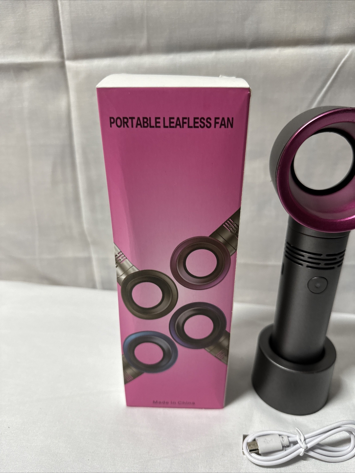 Handheld leafless fan desktop portable creative mini fan USB rechargeable PINK gallery