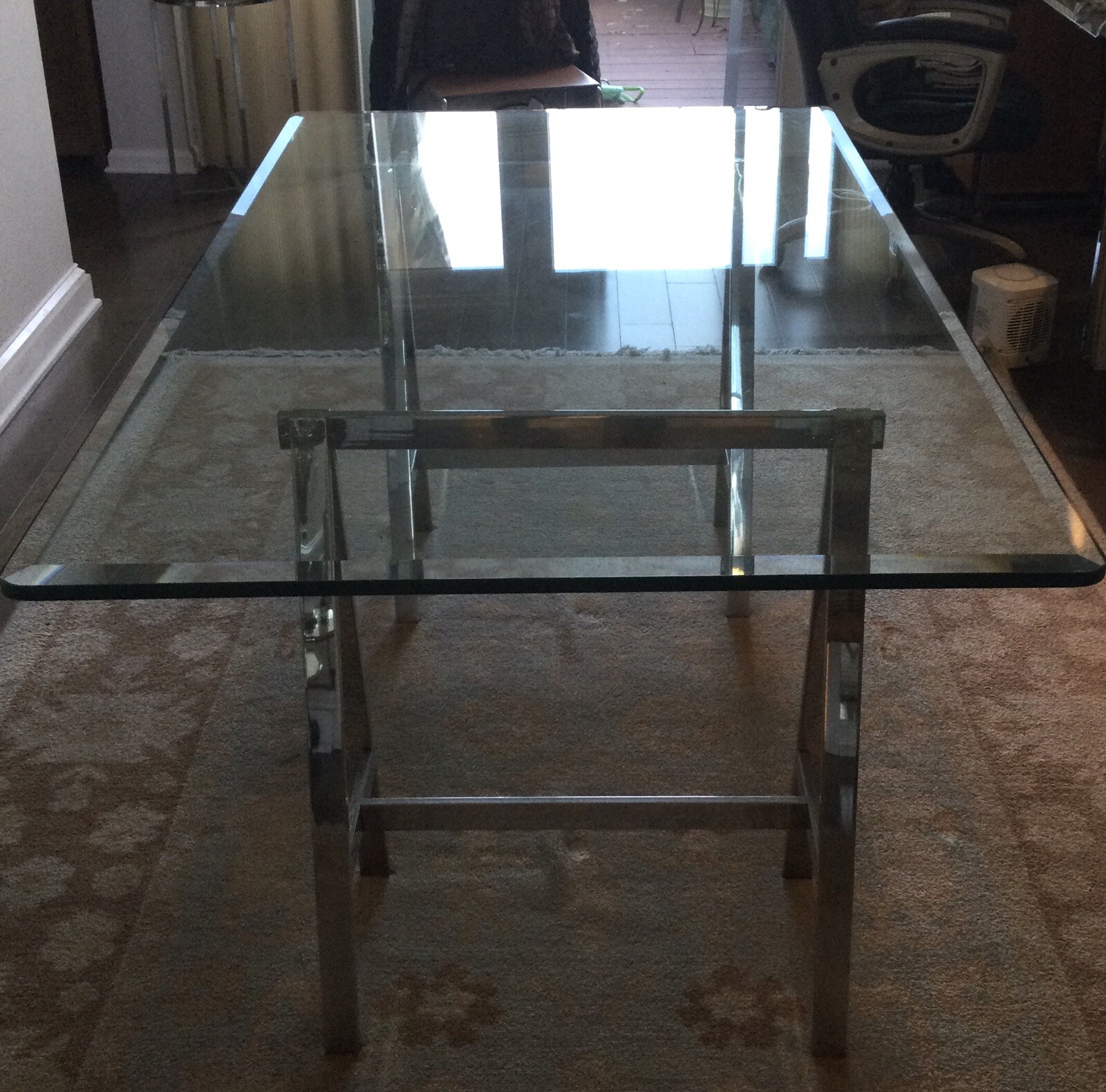 Heavy Glass Top Rectangular Dining Table. Beveled Edge. Stainless Steel Bases. gallery