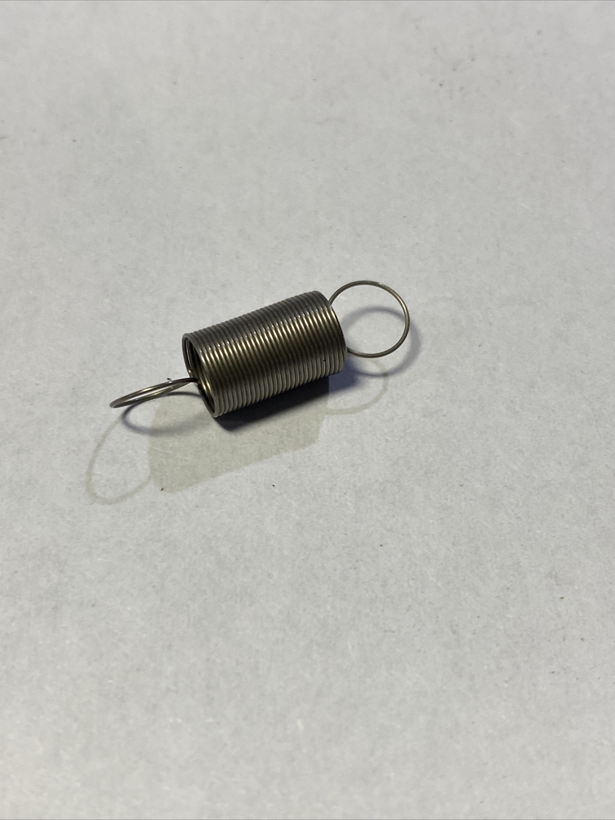 Genuine OEM Briggs & Stratton 790849 Air Vane Spring NOS gallery