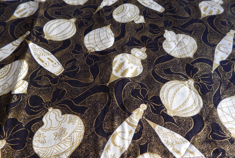 HANDCRAFTED REVERSIBLE QUILTED 42" LONG "ORNAMENTS ON BLACK" TABLERUNNER gallery
