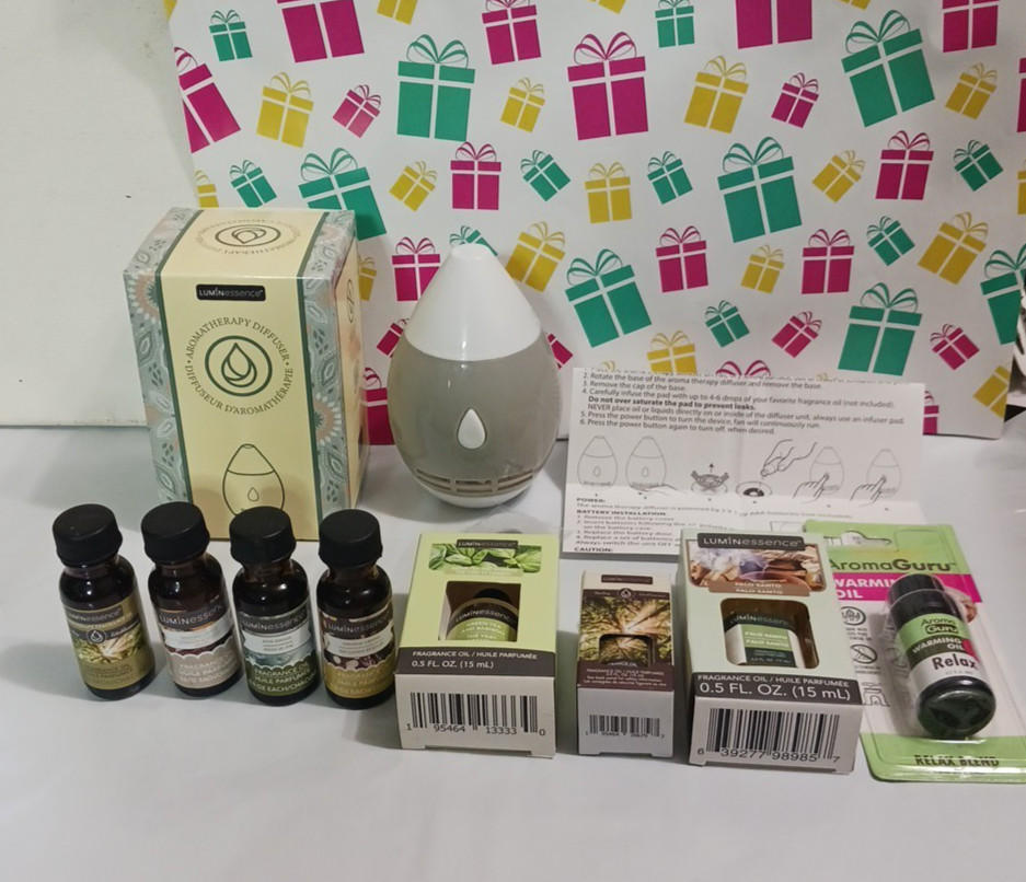 Fragrance Oil + portable diffuser. You get all 8 different scents. New gallery