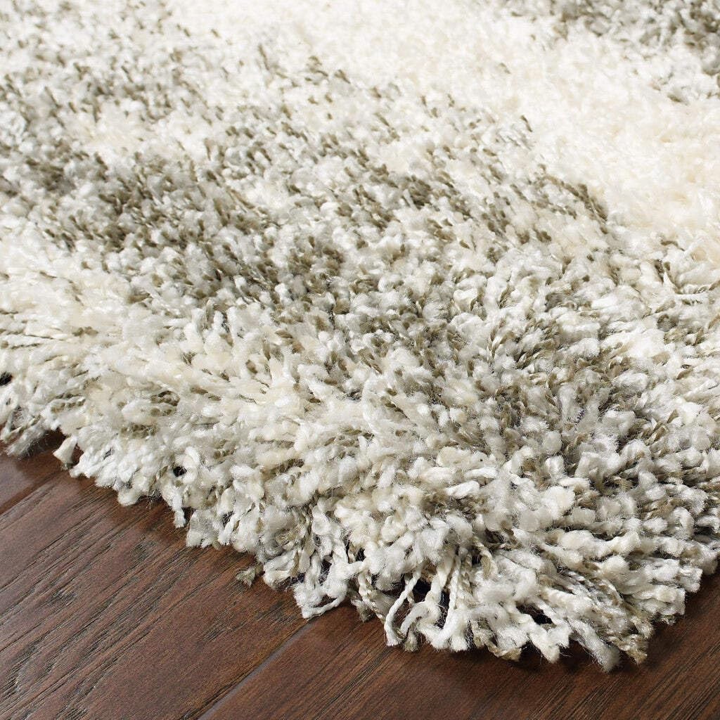 5 Grey Ivory And Silver Geometric Shag Power Loom Stain Resistant Area Rug gallery