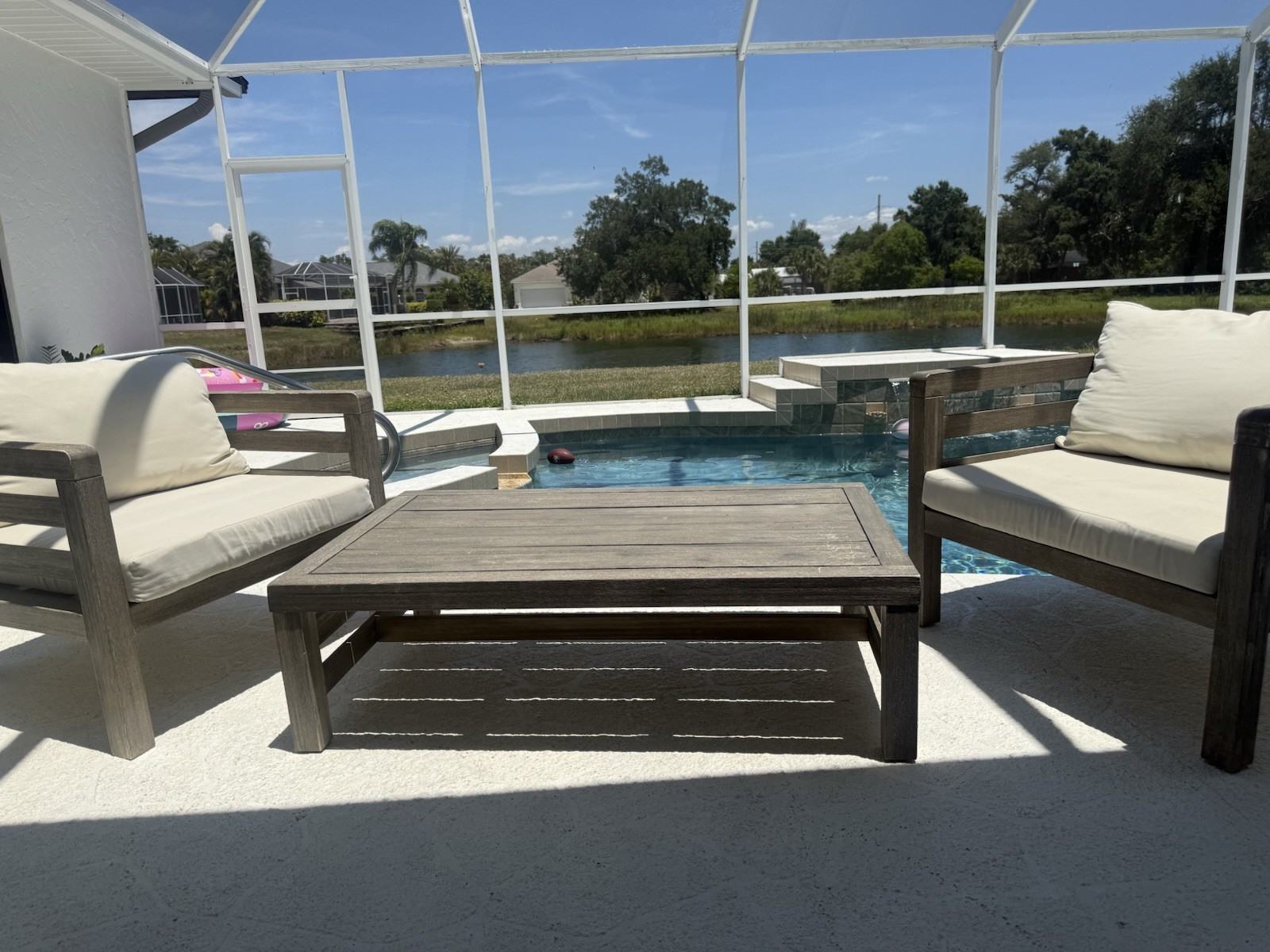 Modern Wood Lounge Set with Beige Cushions, Brown Chairs & Rectangular Table gallery