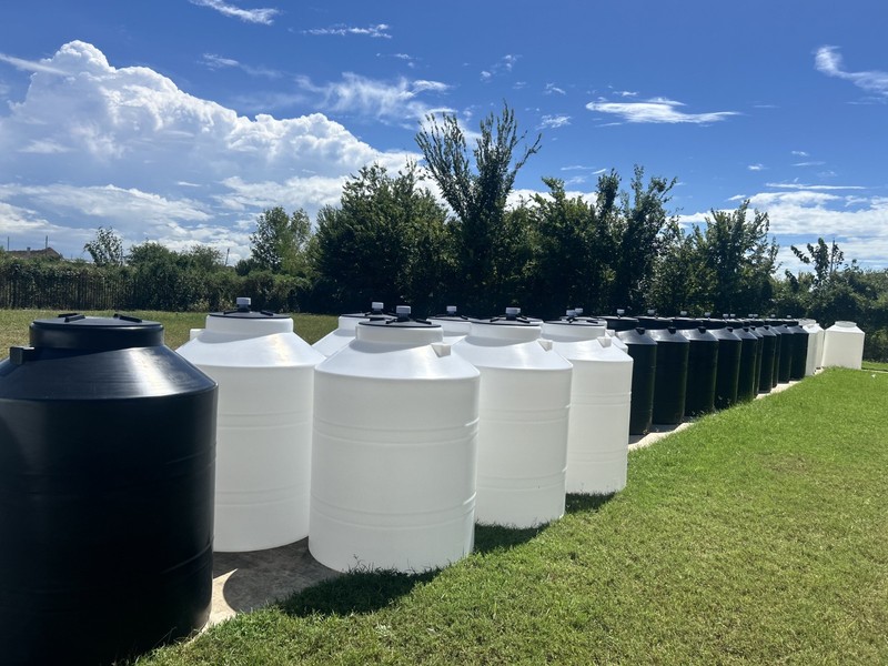 300 Gallons Tanks. Plastic. 42" Diameter by 57" Height. Lid Fitting and Valve. gallery