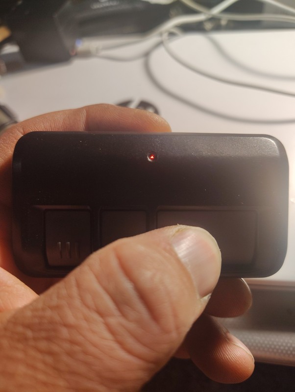 Generic Used Unbranded Three-button Garage Door Remote With Battery gallery