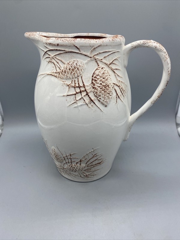 NEW Creative co-op 9"H Dolomite Pitcher with Pine Cones Beige/Terra Cotta gallery