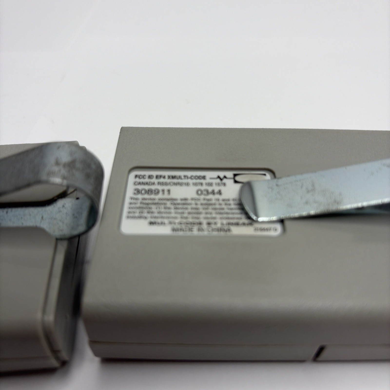Multi-Code 0440 Linear Gate/Garage Opener 2 Remotes With Visor Clips,tested gallery