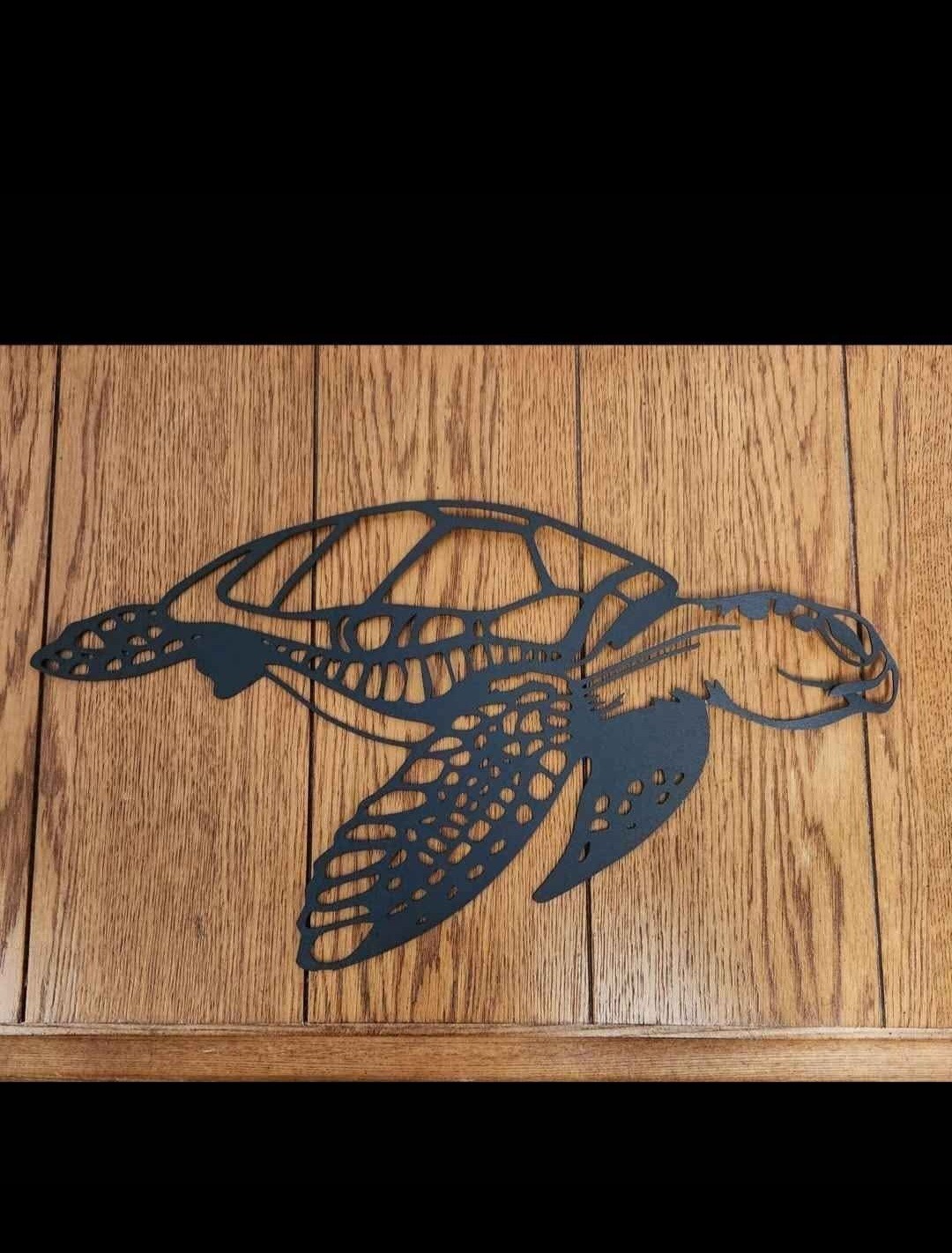 Black Metal Sea Turtle design for wall decoration. 16 in wide × 9 in tall gallery